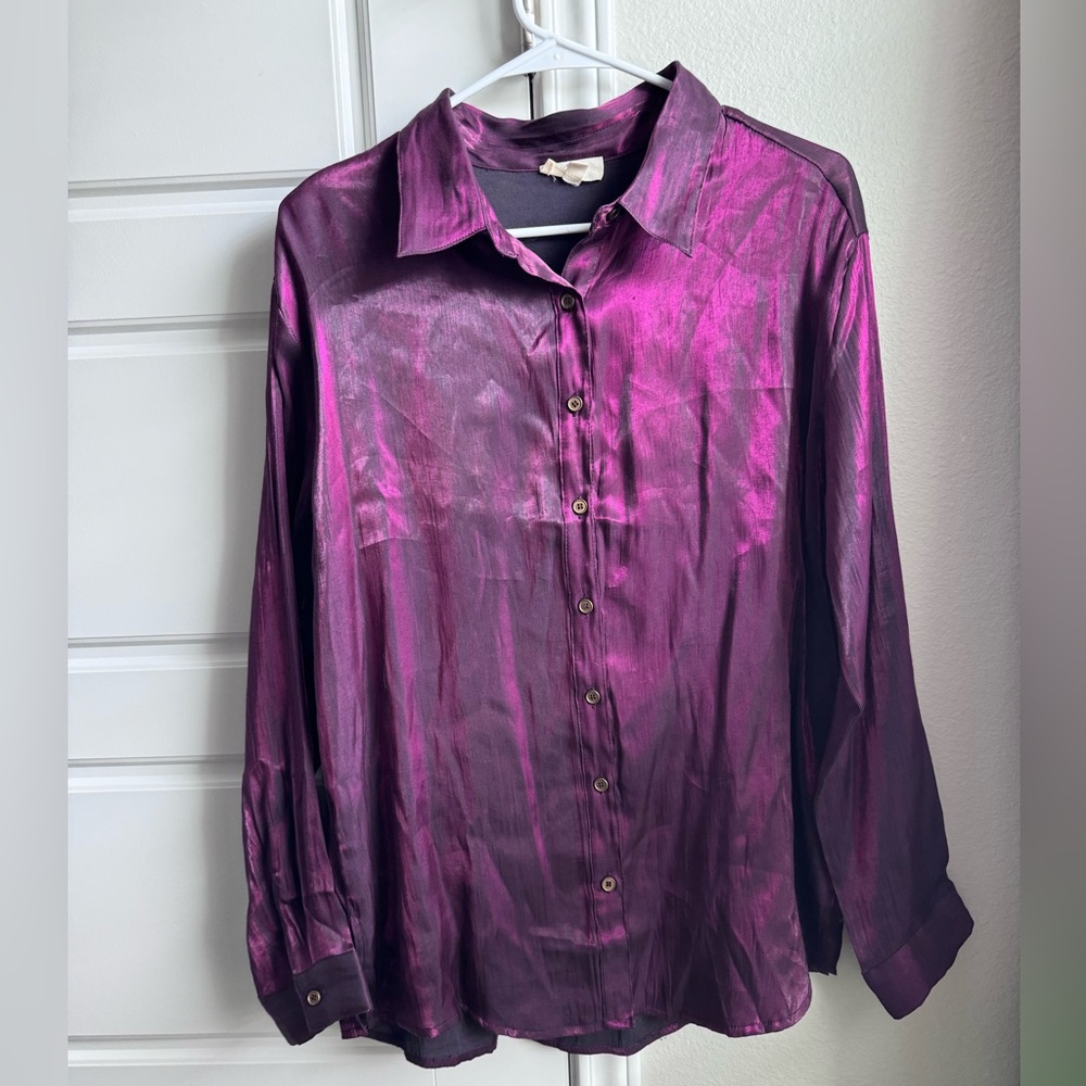 Bright purplish button up shirt.